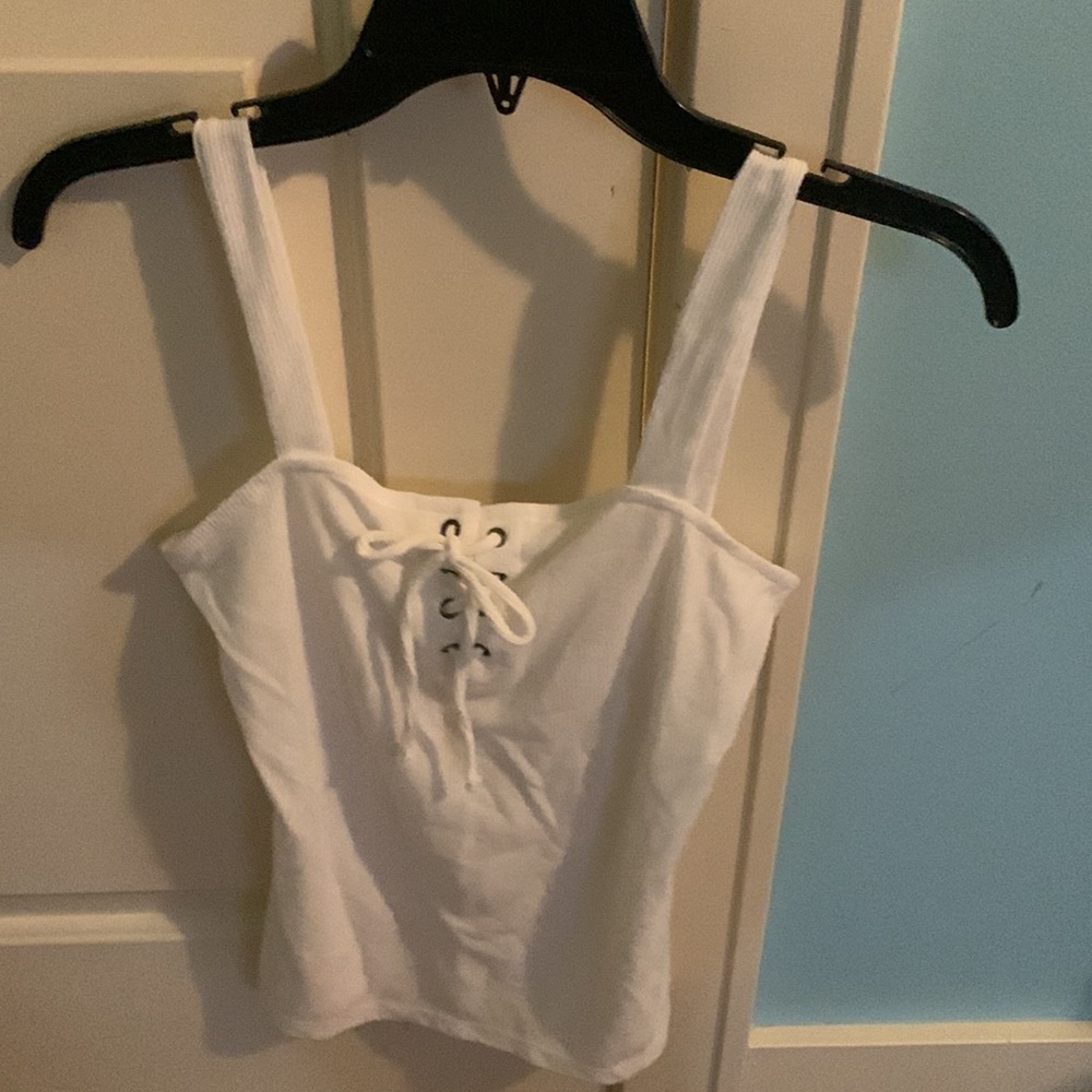 White tank top with cross detail